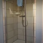 Gemuetliches Dachgeschoss-apartement Mit Seeblick Und Grossem Garten Am Wasser By Interhome *
