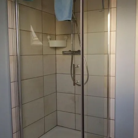 Gemuetliches Dachgeschoss-apartement Mit Seeblick Und Grossem Garten Am Wasser By Interhome *